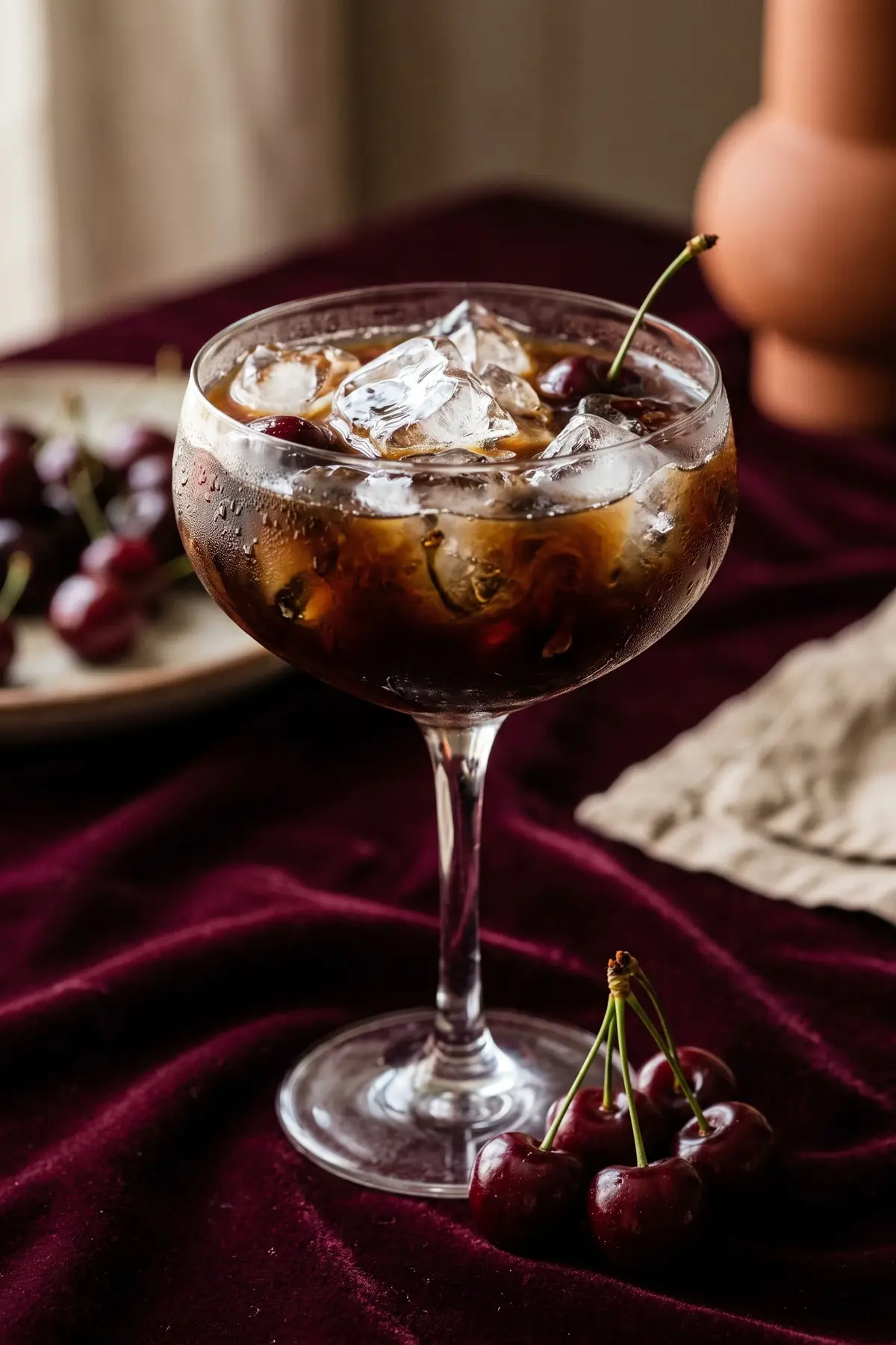 A glass of cherry iced coffee