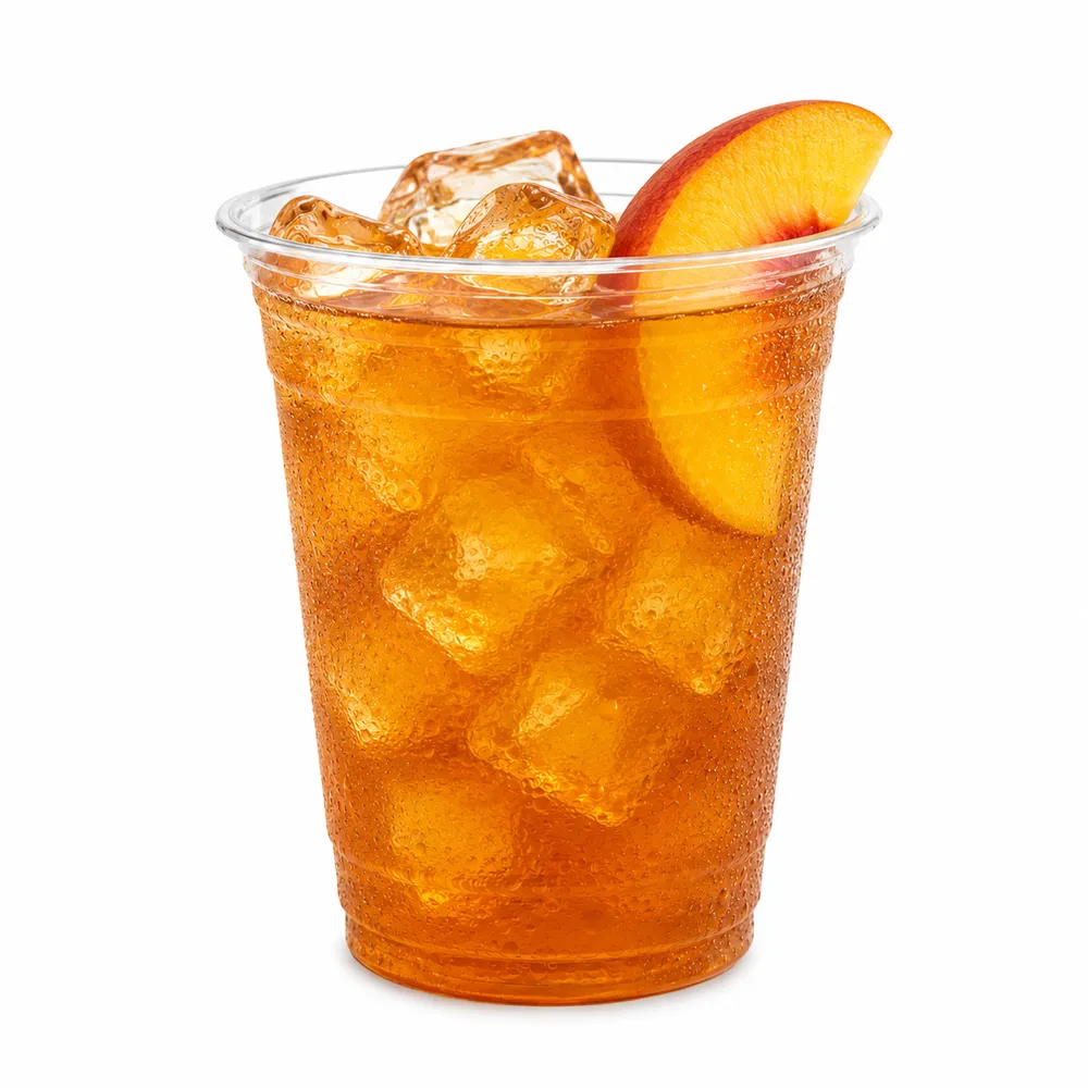 Mabu Peach Iced Tea served over ice in a clear cup with a golden peach hue